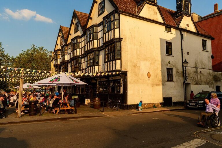 The timber-framed Llandoger Trow on King Street in golden light