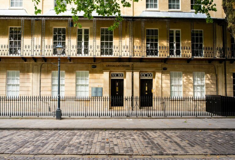Georgian frontages with railings on Queen Square, Bristol