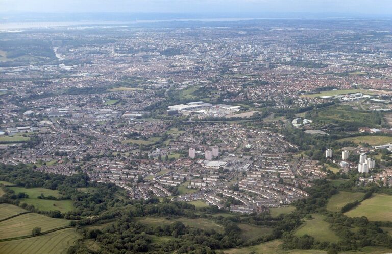 An aerial view over Hartcliffe with the rest of Bristol beyond