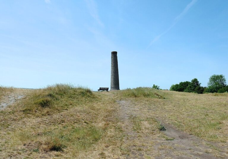 The grassy summit path on Troopers Hill leading to the chimney