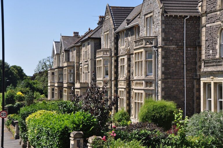 Large stone Victorian houses with front gardens on Downleaze